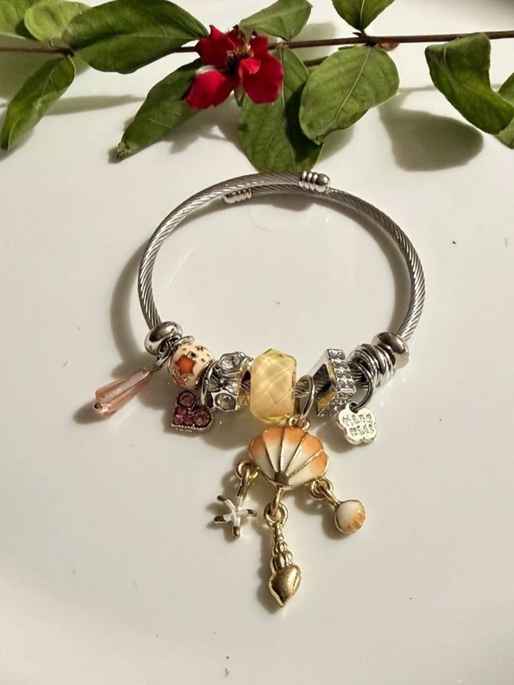 Charm Bracelet in Silver & Gold Tone
New Never Worn